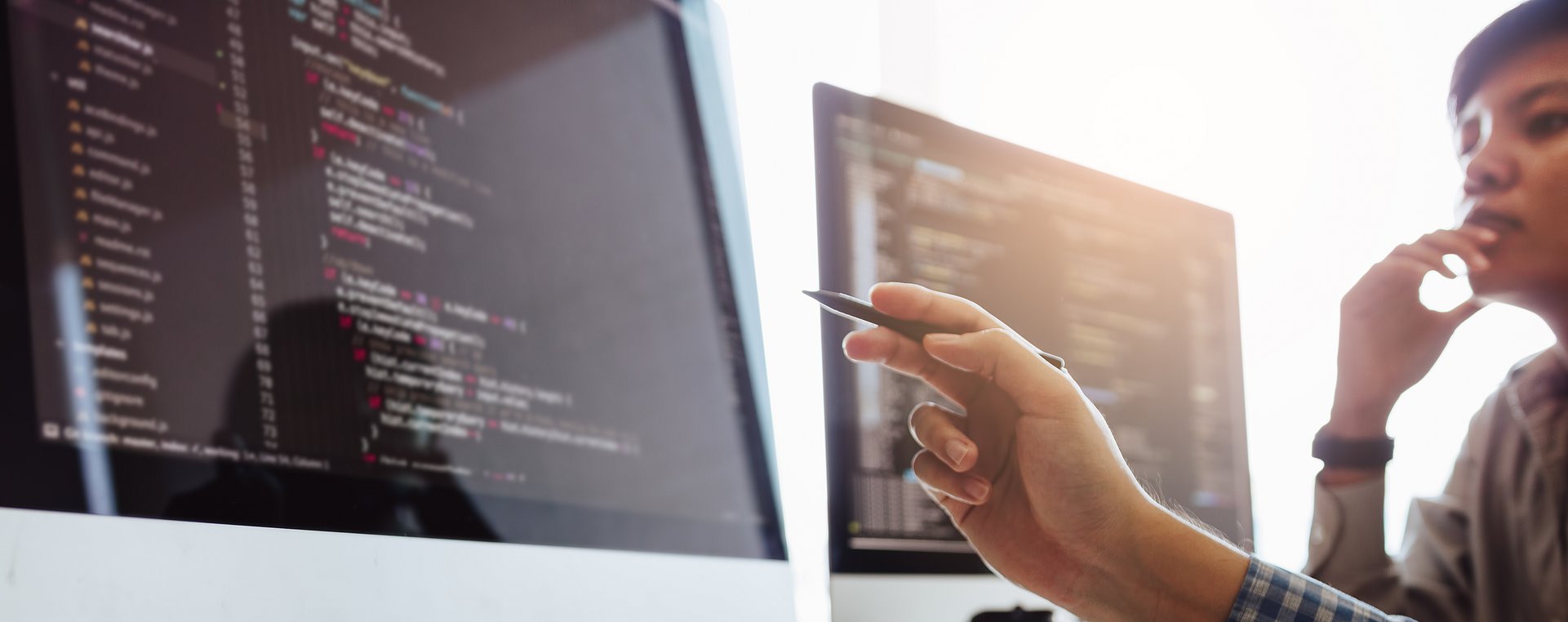 Developing programming and coding technologies working in a software engineers developing applications together in office. Foundation