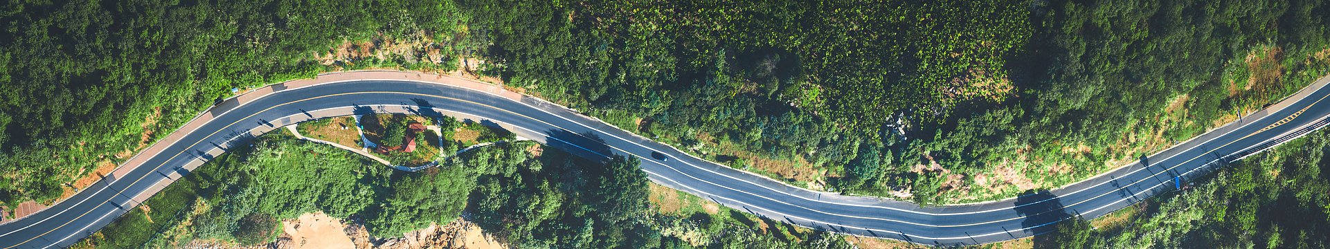 Aerial view of the sandy beach and road Organization