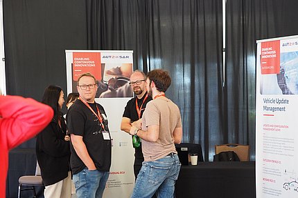 AUTOSAR 14th AOC 2023 attendees talking 14th AUTOSAR Open Conference