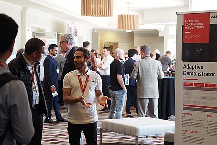AUTOSAR 14th AOC 2023 attendees talking 14th AUTOSAR Open Conference